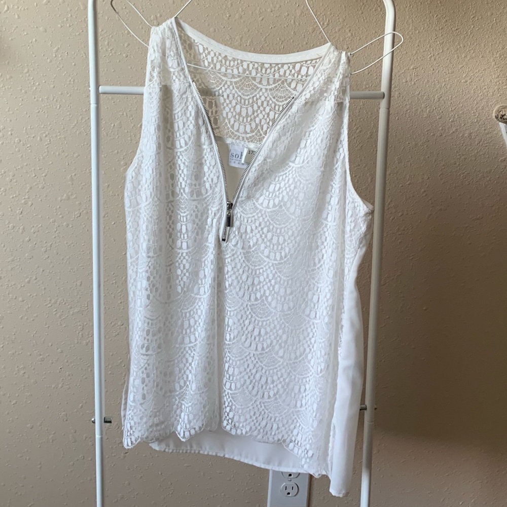 White lace sleeveless blouse